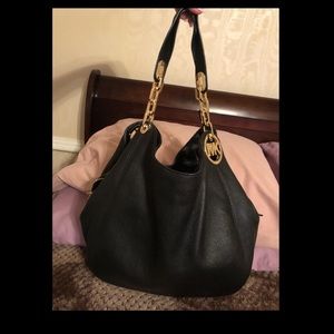 Micheal Kors Black Purse With Gold Hardwear